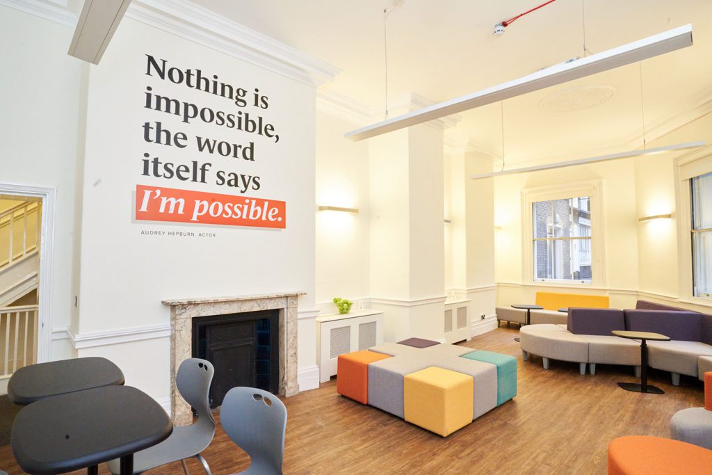Bright and colourful room at BSC London with inspirational quote on the wall